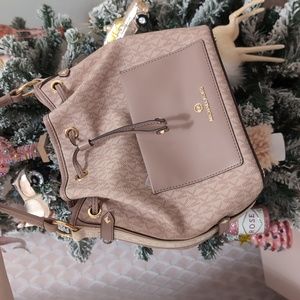 Michael Kors bucket bag mauve/pink and cream initial print